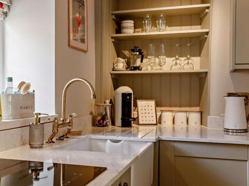 a kitchen with a sink and a counter at 1 Bed in Stamford oc-92406 in Ketton