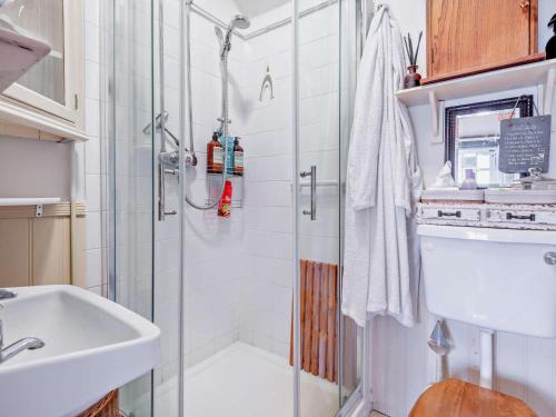 a bathroom with a shower and a sink at 1 Bed in Lymington oc-94751 in Lymington