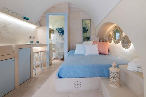 Llit o llits en una habitació de Angolo Laggetto