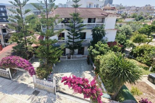 an aerial view of a house with flowers and trees at Garden Villa Veli in Ksamil