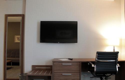 TV a/nebo společenská místnost v ubytování Casa Inn Business Irapuato