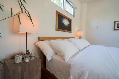 Cama o camas de una habitación en Moana Surf Resort