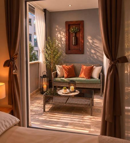 a living room with a couch and a table at Johanan in Makarska