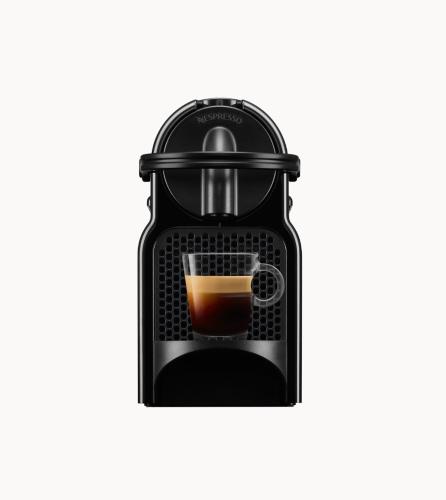 a coffee maker with a cup of coffee at Gîte Chez Dédé in Brillac