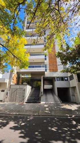 a building with a staircase in front of it at TORRE GUAYASAMIN in Corrientes