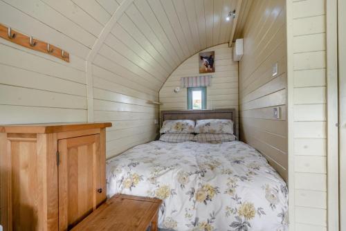 a bedroom with a bed in a small room at 1 Bed in Hereford oc-81293 in Aconbury