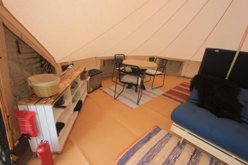 an overhead view of a tent with a table and chairs at Stamsjö Glamp in Åsele