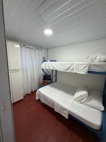a bedroom with two bunk beds in a room at El Respiro in Buenavista