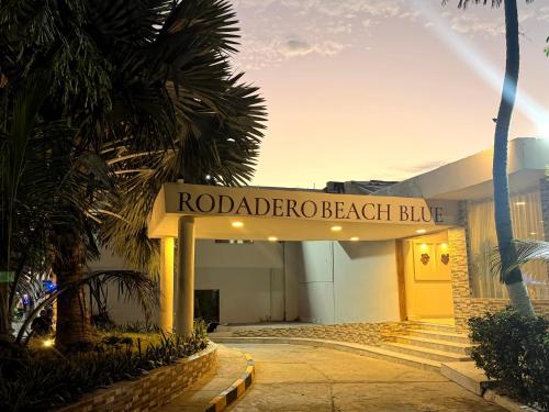 a building with a sign that reads rodario beach blazed at Hotel Rodadero Beach Blue in Santa Marta