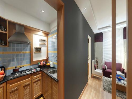 Una cocina o cocineta en Melange Luxury Serviced Apartments