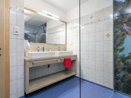a bathroom with a sink and a shower at Apartment Birgit in Zellberg