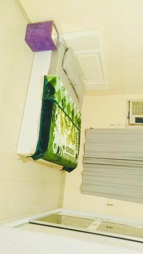 a bag hanging from a ceiling in a room at شقق مفروشة العزيزية in Hail