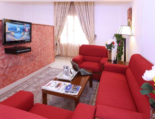 A seating area at Al Maha Int Hotel Oman