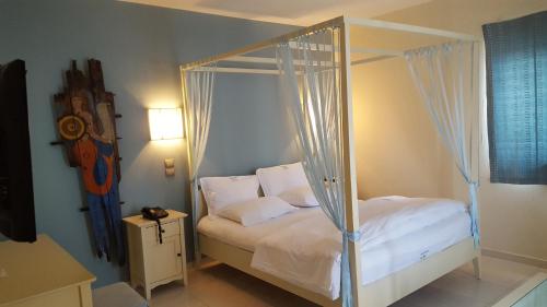 Ένα ή περισσότερα κρεβάτια σε δωμάτιο στο Sea Sight Boutique Hotel
