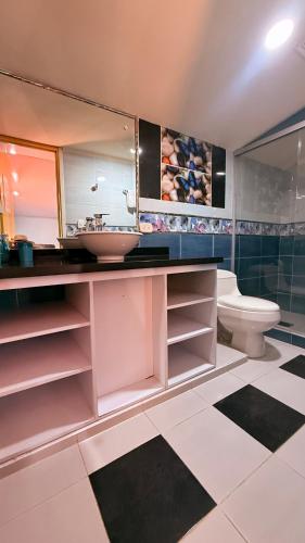 a bathroom with a sink and a toilet at Casa Salento in Salento
