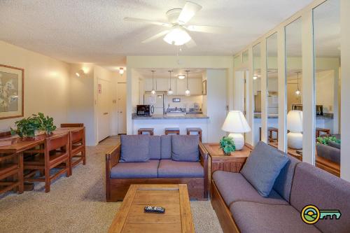 a living room with a couch and a dining room at Aspen East Unit #101 in Basye