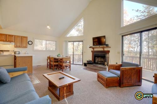 a living room with a couch and a table at Villa #91 in Basye