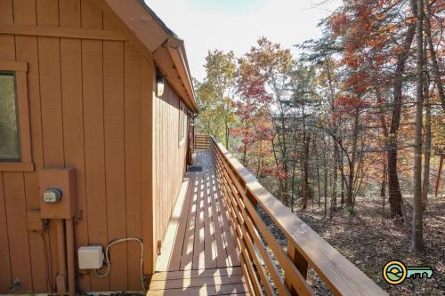 a wooden deck on the side of a house at Villa #364 in Basye