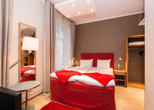 Voodi või voodid majutusasutuse Hotell Stadsparken toas
