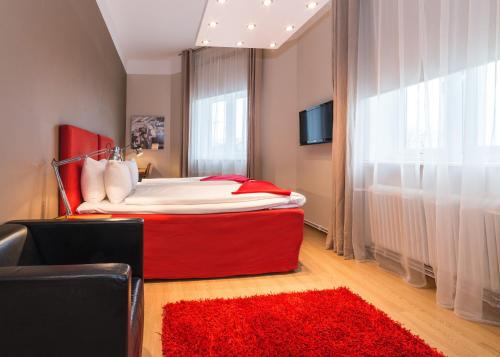 Voodi või voodid majutusasutuse Hotell Stadsparken toas