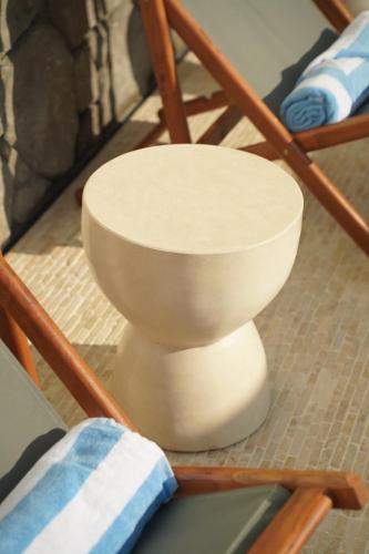 a white toilet sitting on top of a chair at Nagomi Studio Nyanyi in Cemagi