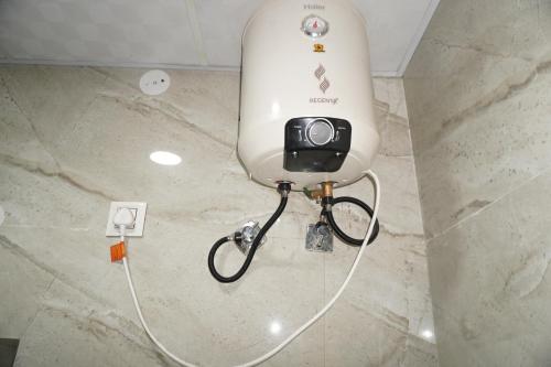 a machine with a camera attached to a wall at Hotel Moon Mahal in Jaipur