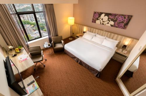 an overhead view of a hotel room with a bed and a desk at Sunway Hotel Georgetown Penang in George Town