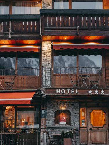 a hotel on the side of a building at Hôtel Le Monal in Sainte-Foy-Tarentaise