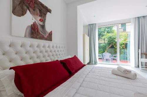 Ένα ή περισσότερα κρεβάτια σε δωμάτιο στο Hotel Cavallino Bianco