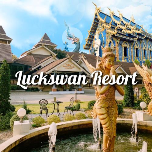 a mermaid statue in front of a fountain in front of a building at Luckswan Resort Chiang Rai - SHA Extra Plus in Chiang Rai