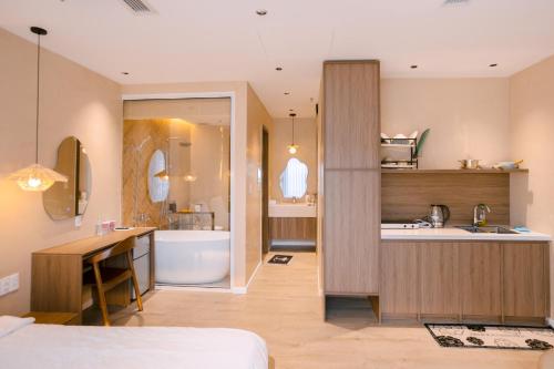 a bathroom with a sink and a tub and a sinkessment at UMEE Homestay in Thôn Trường Giang
