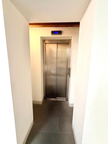 Attico con ascensore e vista tetti