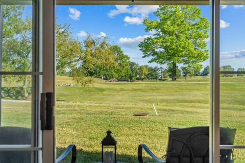 a view of a field from a window at Austin's Hideaway Golf-view in Branson