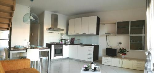 A kitchen or kitchenette at Casa Letizia