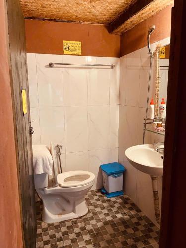 a bathroom with a toilet and a sink at La Beauté Nghia Do in Nghĩa Ðô