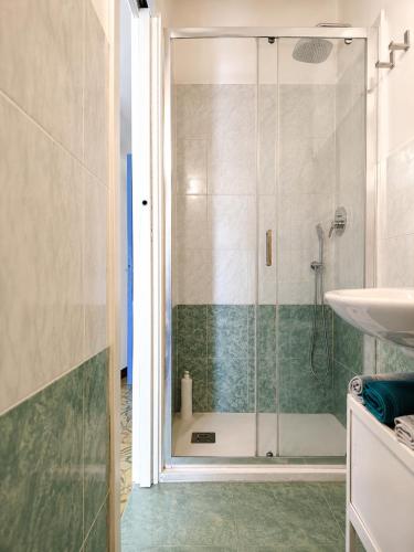 a bathroom with a shower and a sink at Casa di Clara in Rapallo