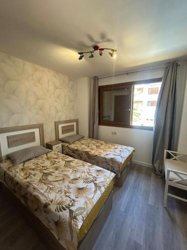 Apartment En Punta Prima con 3 Piscinas, 2 dormitorios,2 baños ,parking y seguridad 24 horas
