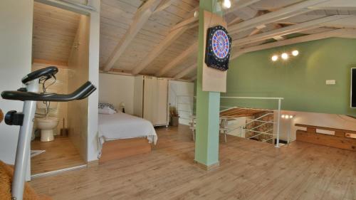 a room with a bed and a table in a room at Villa Skala by Villas Guide in Novi Vinodolski
