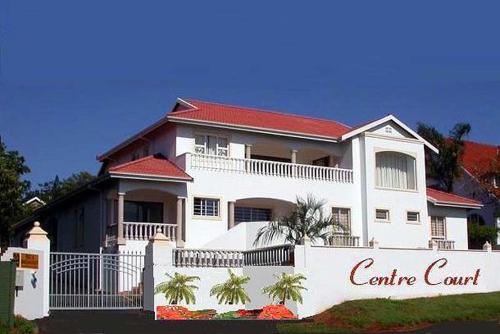 a white house with a red roof at Heavens stay in Vosburg