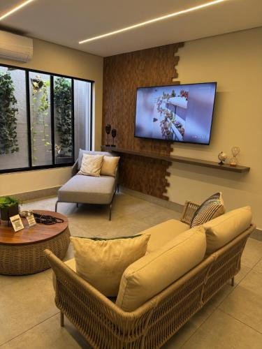 Televisyen dan/atau pusat hiburan di Hotel Conviver