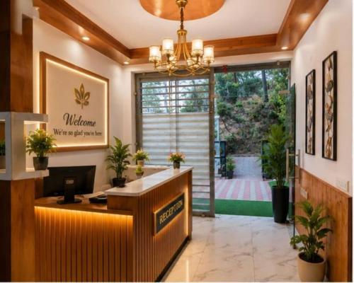 an office with a lobby with a reception desk at Hotel The Girnaar Near Valley View Dharampur Kasauli Road in Dharampur