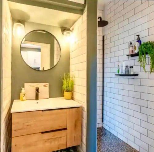 a bathroom with a sink and a mirror at Umdloti Holiday Resort 208 in Umdloti
