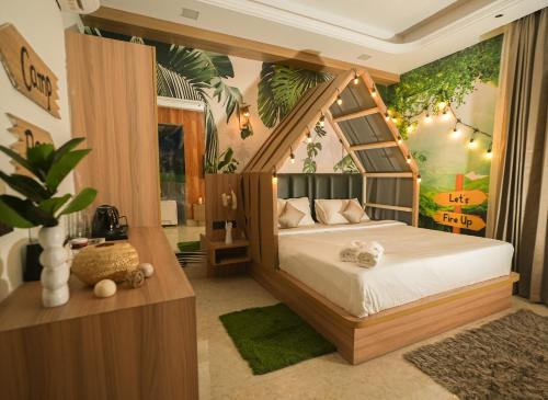 a bedroom with a canopy bed in a room at Orsom Stay Rooms with Jacuzzi Sector 53 Gurgaon in Gurgaon