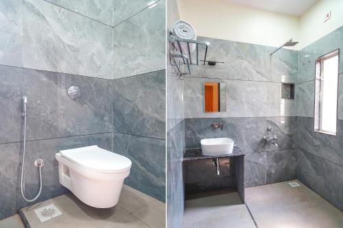 a bathroom with a toilet and a shower and a sink at FabHotel Nakshtra Resort in Tāsgaon