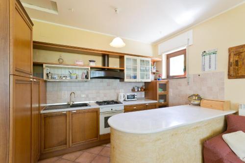 a kitchen with a white counter top in a room at Casale Rustico ColleBello in Castiglione Messer Raimondo