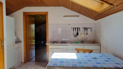 En eller flere senge i et værelse på Haus Strobl