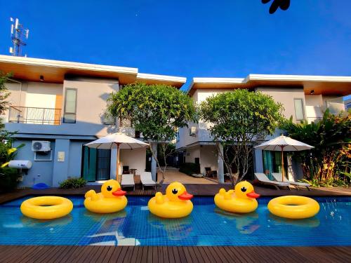 a group of rubber ducks in a pool at Chic Villa 6 in Chiang Mai