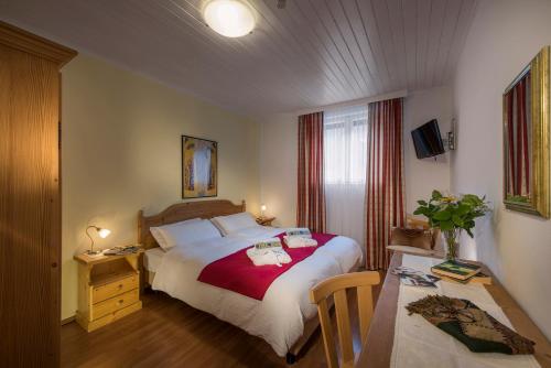 Postel nebo postele na pokoji v ubytování Hotel Bad Salomonsbrunn