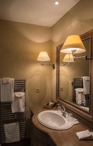 a bathroom with a sink and a mirror at Château Giscours in Labarde