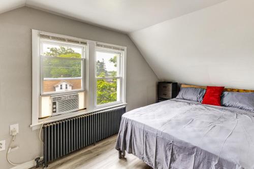 a bedroom with a bed and a window at Train to Philly! Pet-Friendly Unit in Barrington in Barrington